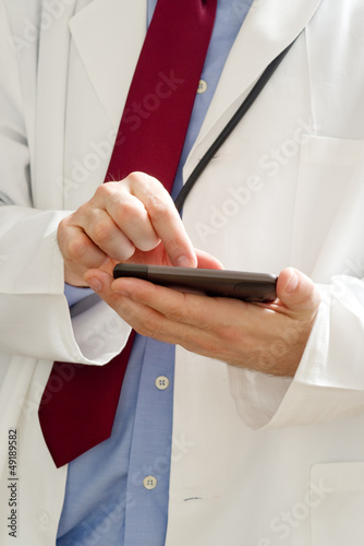 Doctor using smartphone device