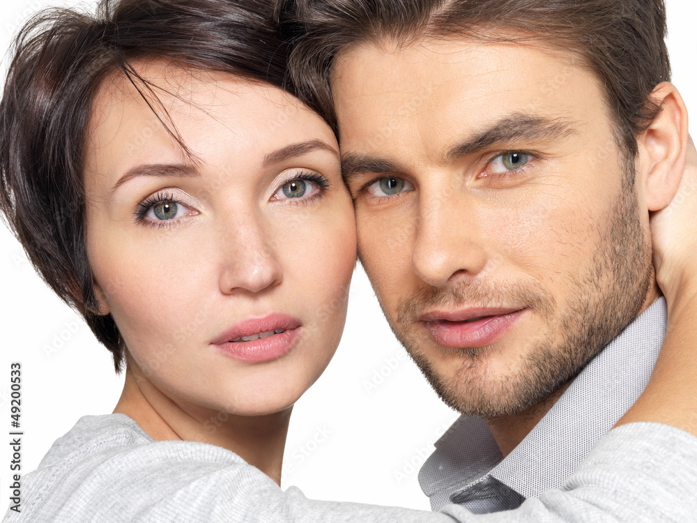 Closeup portrait of beautiful couple - isolated Closeup portrait of beautiful couple - isolated