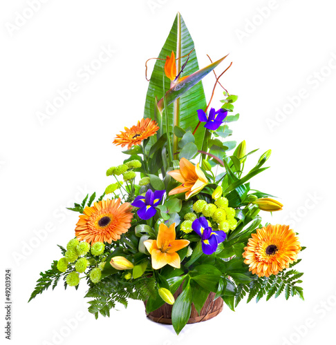 Fototapeta Naklejka Na Ścianę i Meble -  Bright flower bouquet in basket isolated over white background
