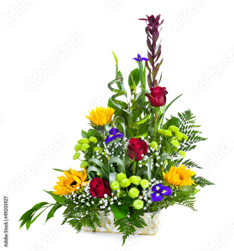 Fototapeta Naklejka Na Ścianę i Meble -  Bright flower bouquet in basket isolated over white background