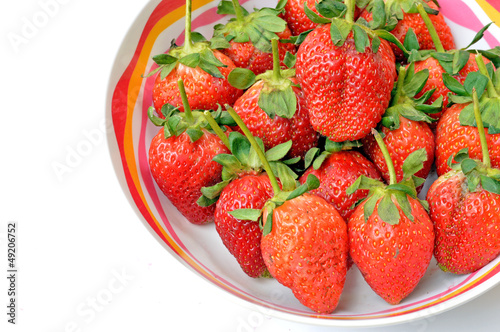 isolated strawberries in bowl