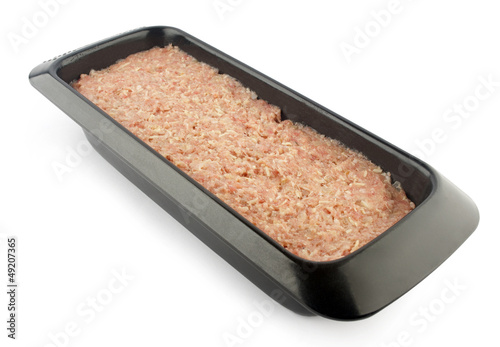 Freshly prepared meatloaf ready for the oven