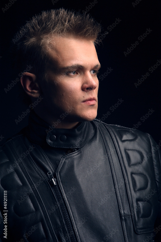 portrait of man in the motorcycle jacket portrait of man in the motorcycle jacket