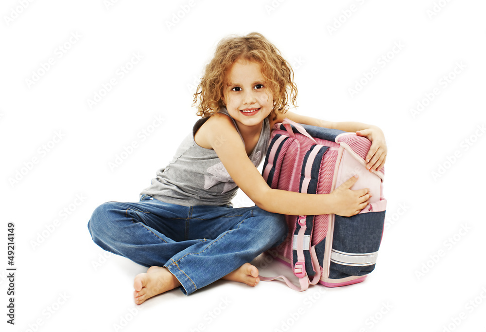 Portrait of smiling school girl hugging rucksack Portrait of smiling school girl hugging rucksack