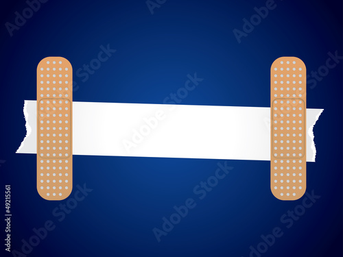 Ripped paper taped with medical tape