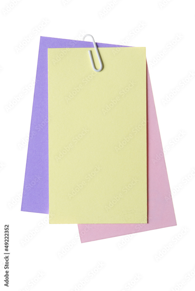 Paper notes with clip isolated on white Paper notes with clip isolated on white