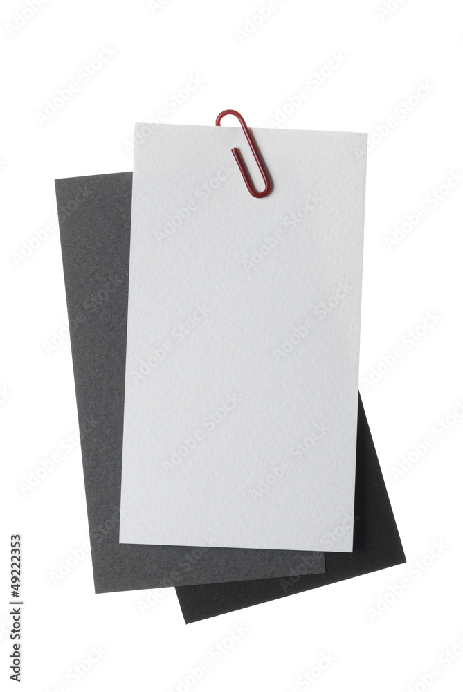 Paper notes with clip isolated on white
