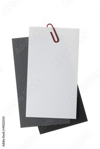 Paper notes with clip isolated on white