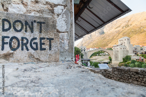Mostar bridge and Don't Forget sign