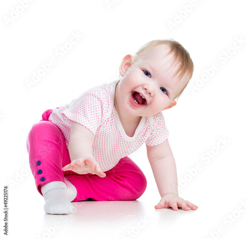 Funny baby sitting on the f...