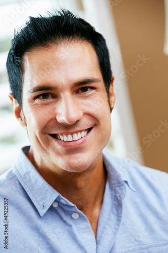 Portrait Of Smiling Man At Home