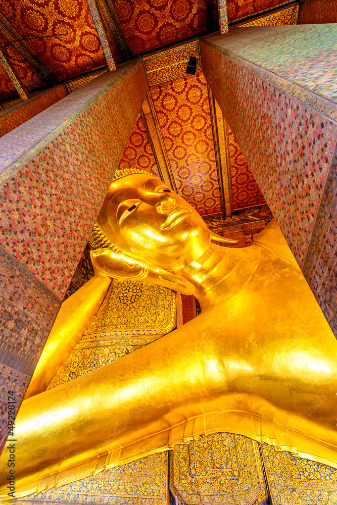The reclining Buddha at Wat Pho temple in Bangkok, Thailand.