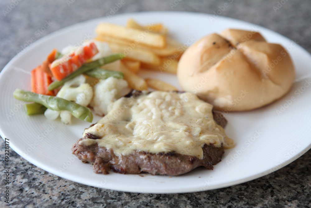 Beef steak with white sauce