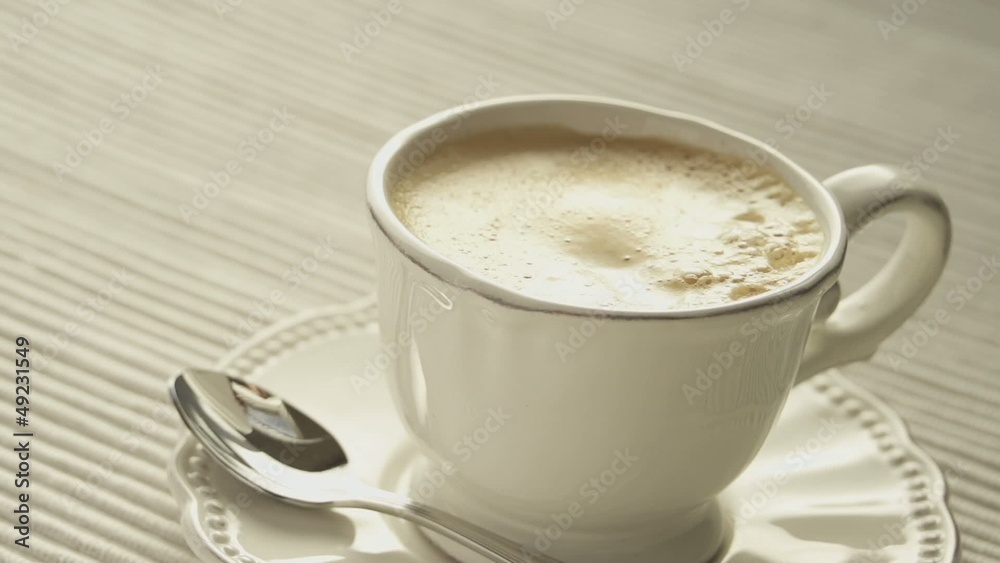 milk-drops splashing in coffee slow motion milk-drops splashing in coffee slow motion