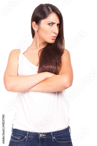 Beautiful casual young woman standing isolated against white bac © maximino gomes