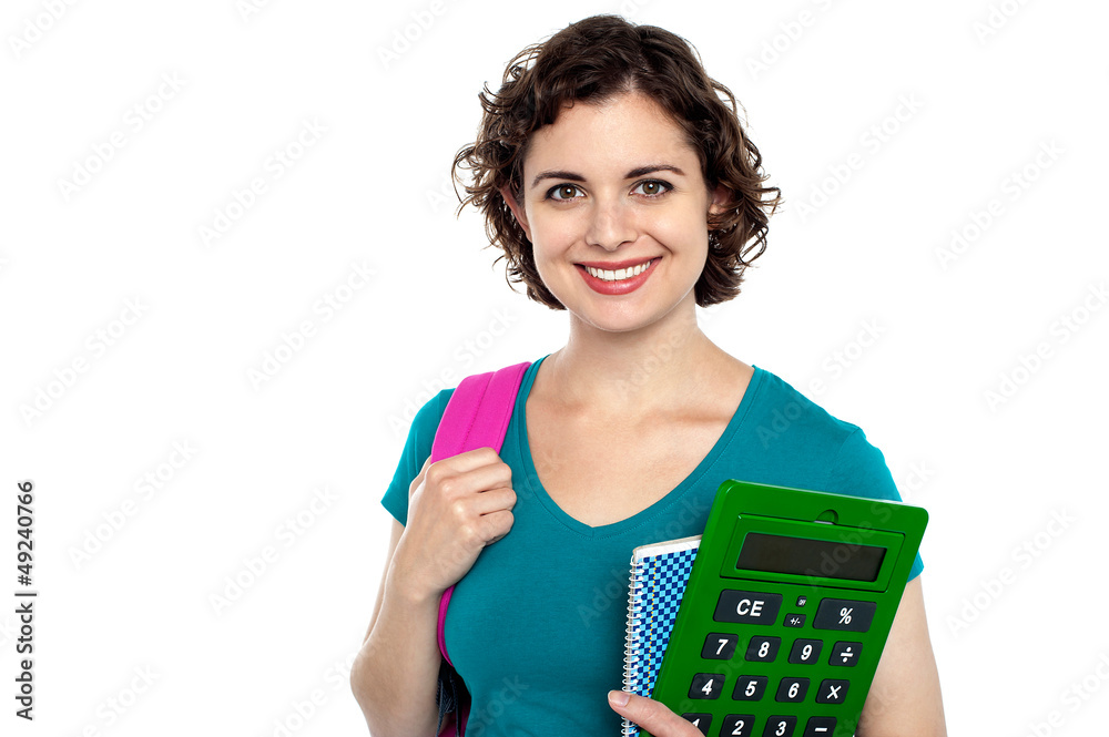 Female student holding education accessories Female student holding education accessories