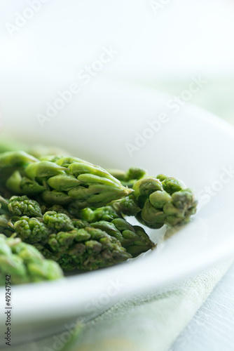 Steamed green asparagus on a plate