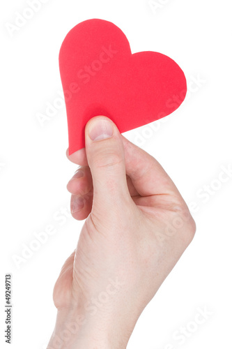 Red paper heart in hand