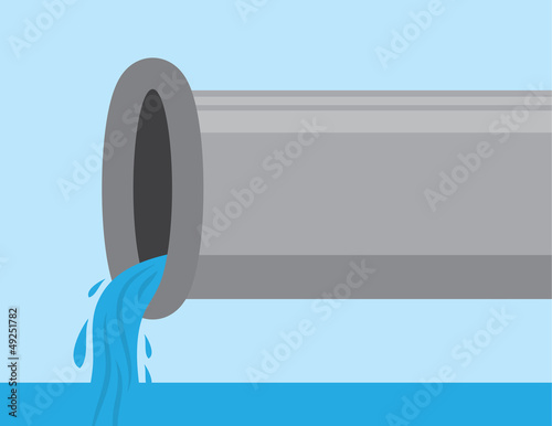 Pipe with clean water pouring into pond