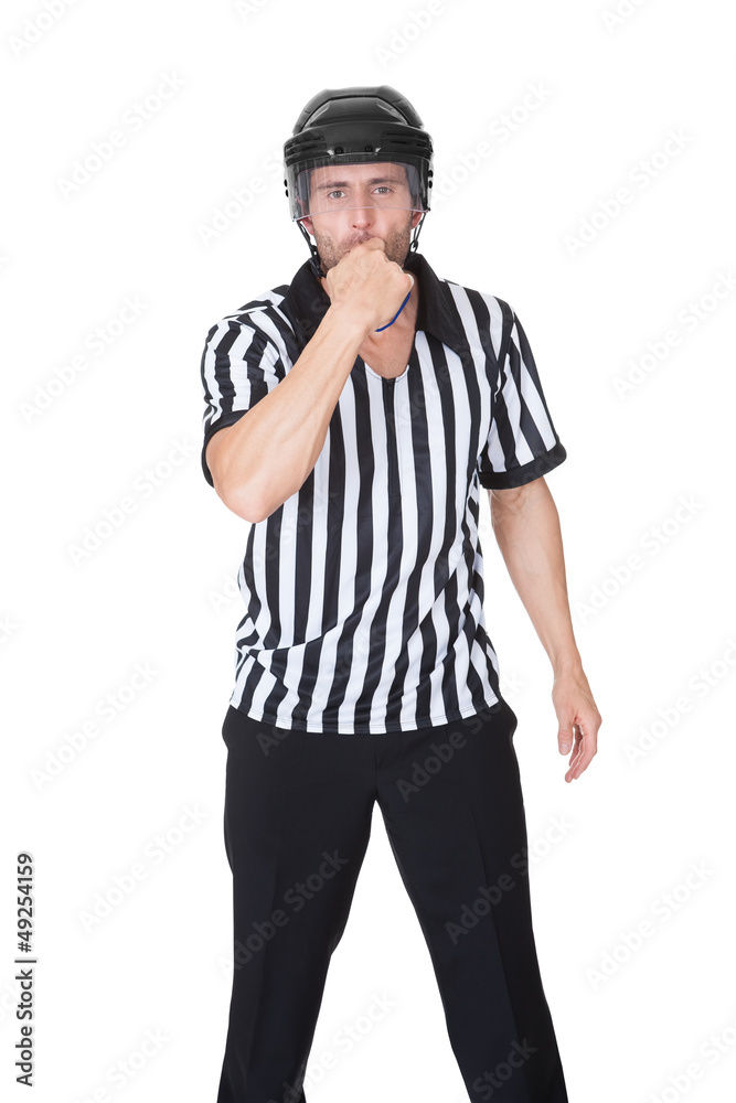 Portrait of hockey judge whistling Portrait of hockey judge whistling