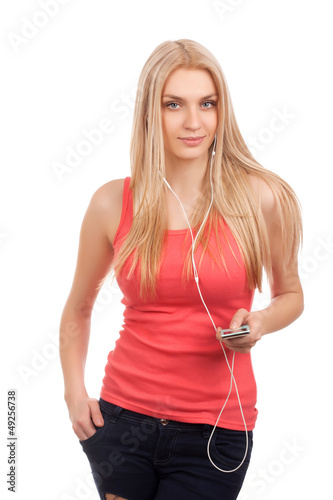 Blond teenage girl listen music © Vankad