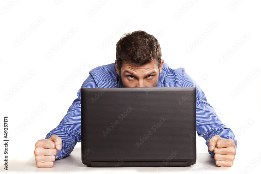 young businessman is having problems with a laptop young businessman is having problems with a laptop