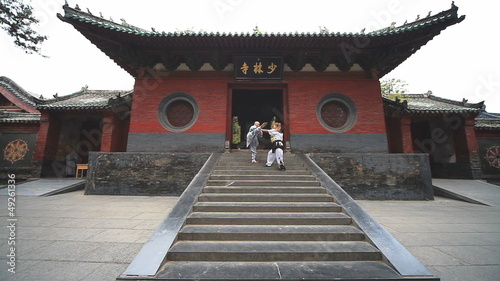 A young couple is practicing Tai Chi in traditional kimono