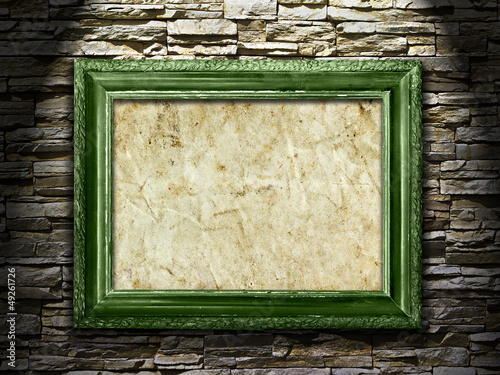 Picture frame on a stone grunge background, highlight.
