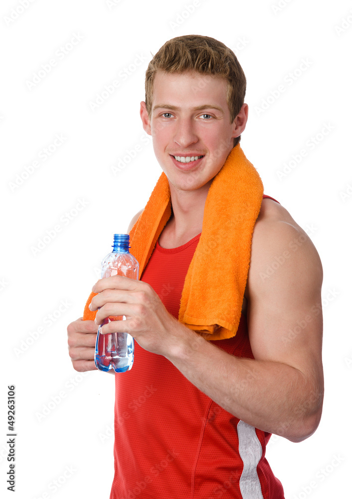 Young athletic man holding a bottle. isolated on white Young athletic man holding a bottle. isolated on white