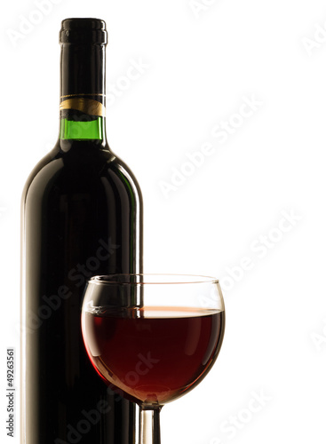 Red wine bottle and glass on white background
