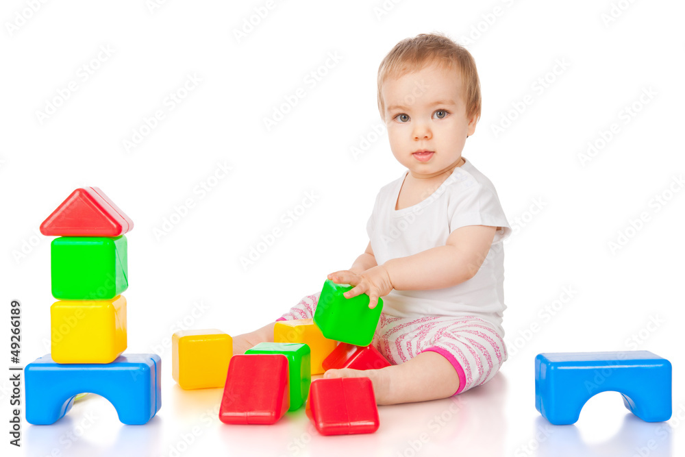 Little girl with blocks, isolated on white Little girl with blocks, isolated on white