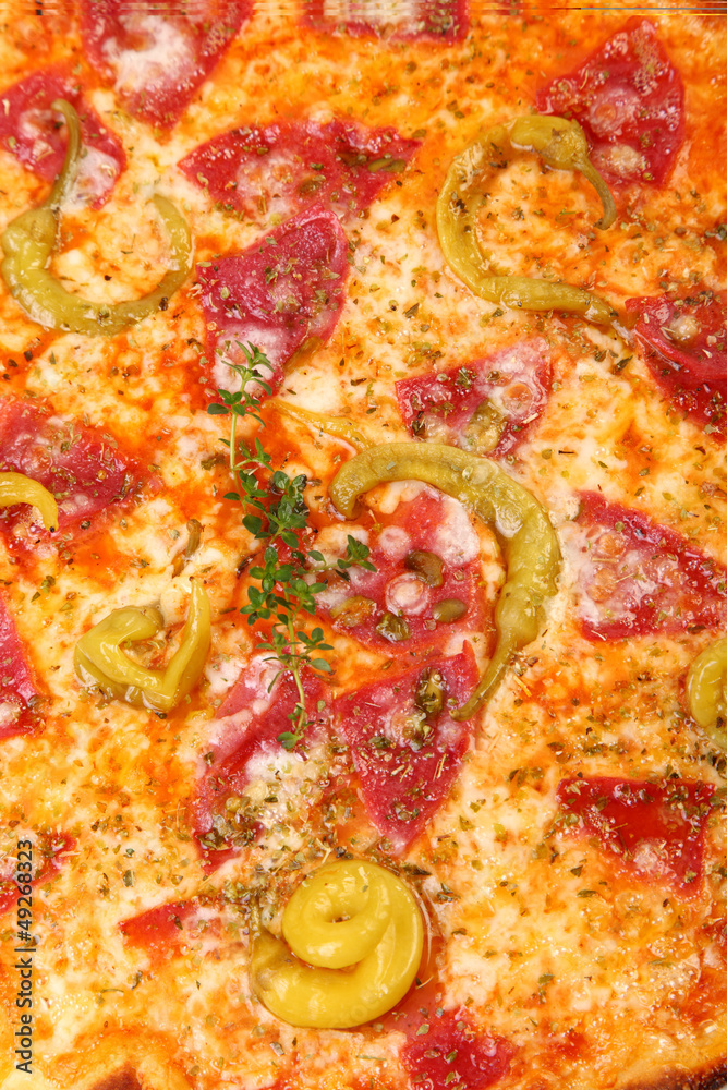 Pizza with salami and pepperoni Pizza with salami and pepperoni