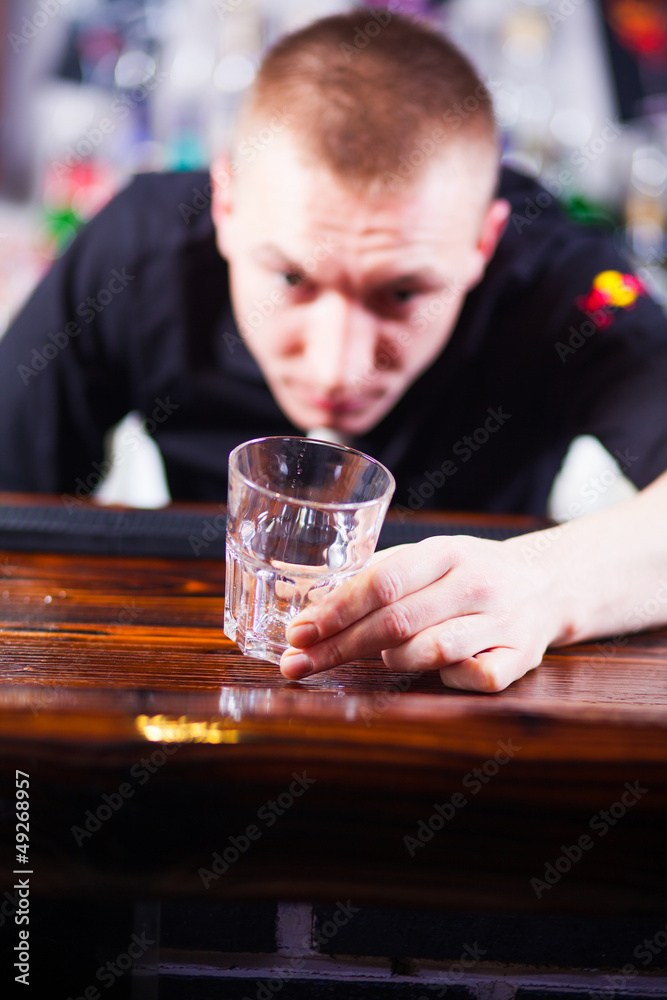 barman making cocktail drinks