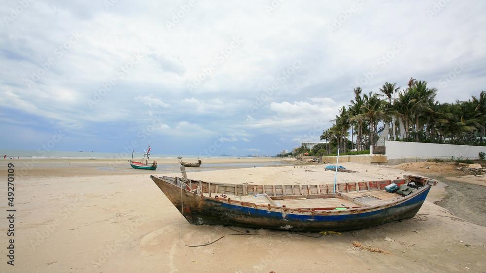Old fisherman boat on the beach in Hua Hin