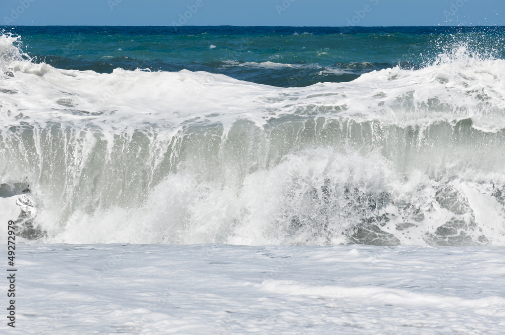 Wave splashing on the beach
