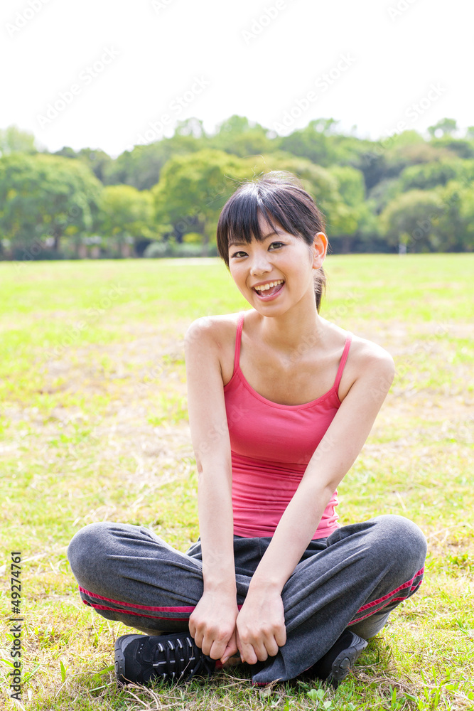 attractive asian woman relaxing in the park attractive asian woman relaxing in the park