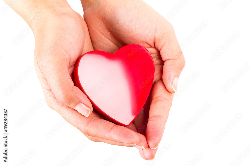 Heart shape in hands as love symbol Heart shape in hands as love symbol