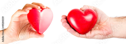 Couple of hands with heart shapes as love symbol