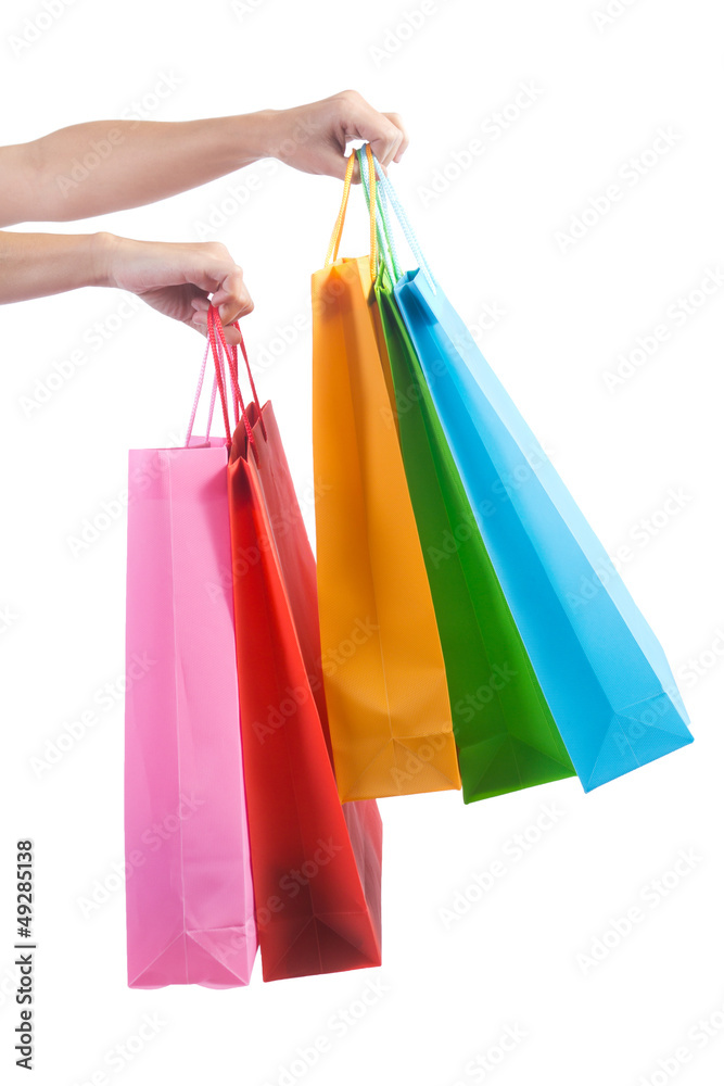 woman arms holding shopping bag