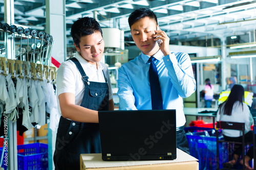 Sticker Worker and customer service of a factory
