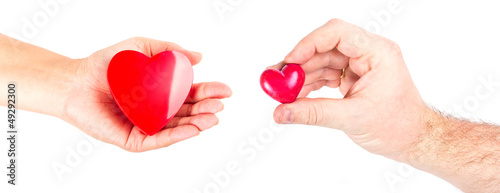 Couple of hands with heart shapes as love symbol