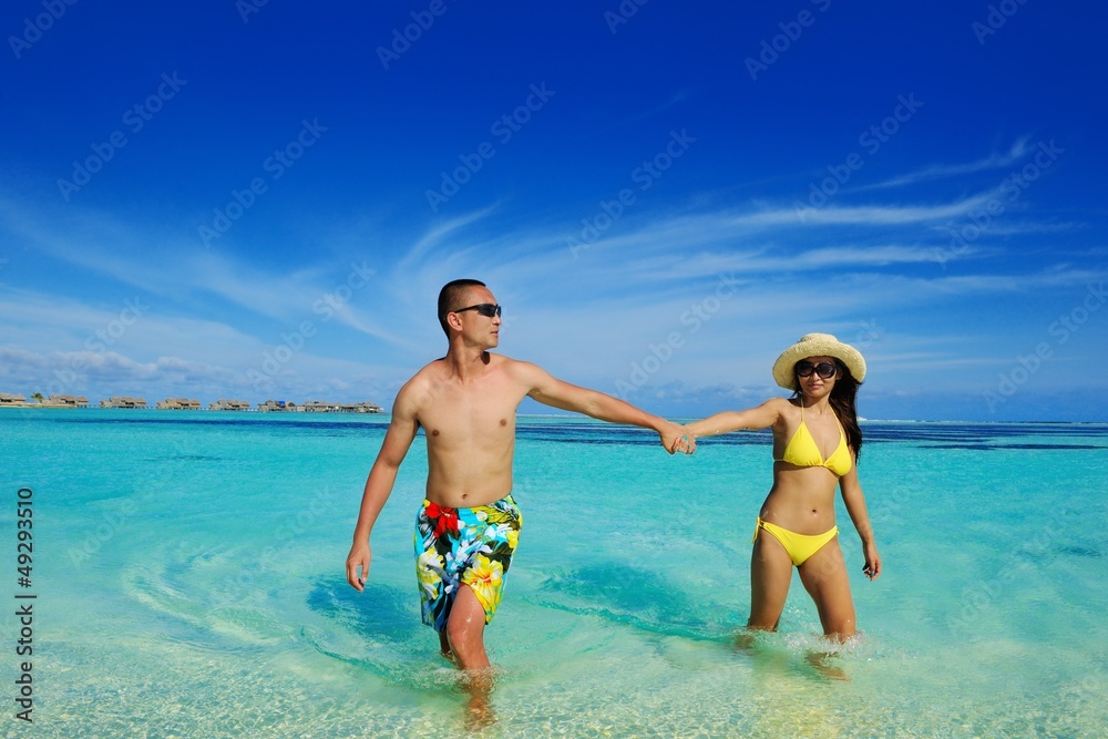asian couple enjoying summer on beach asian couple enjoying summer on beach