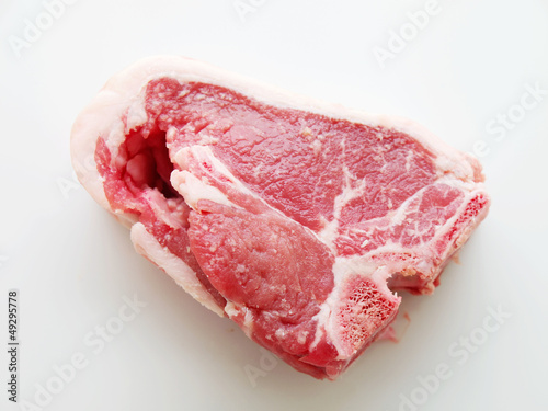 Single Lamb Loin Chop On White Background