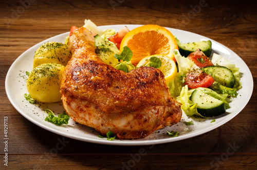 Grilled chicken leg with vegetables
