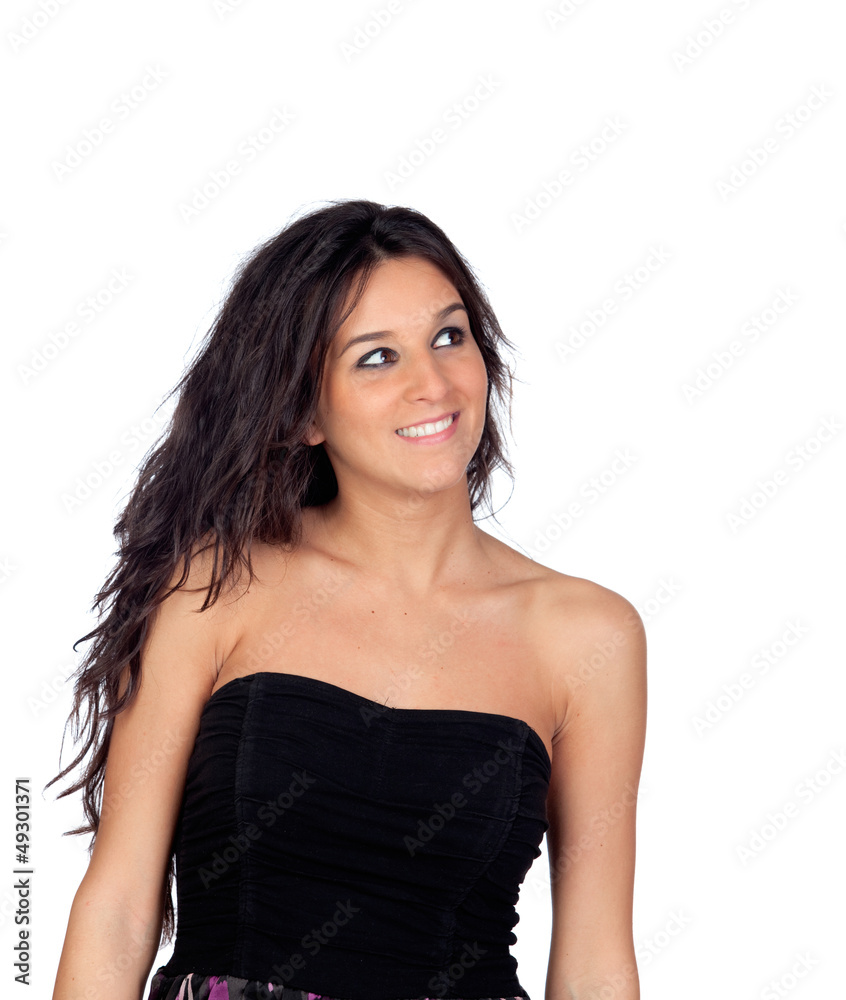 Brunette girl showing her shoulders with a black dress Brunette girl showing her shoulders with a black dress