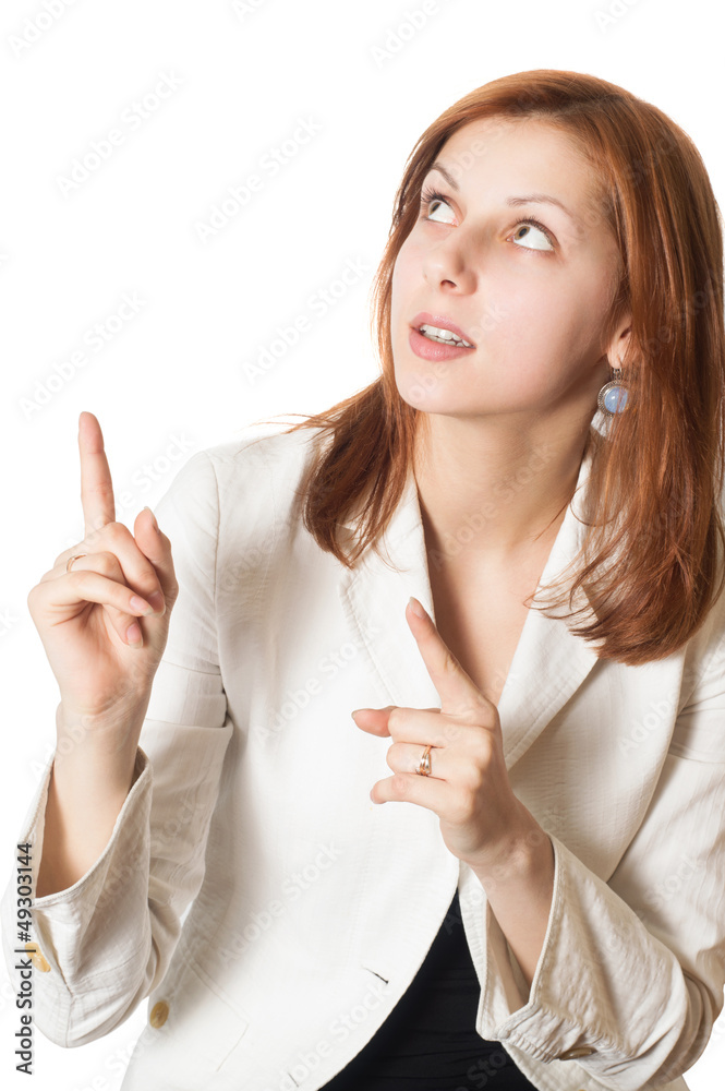 girl looks and shows an index finger upwards girl looks and shows an index finger upwards