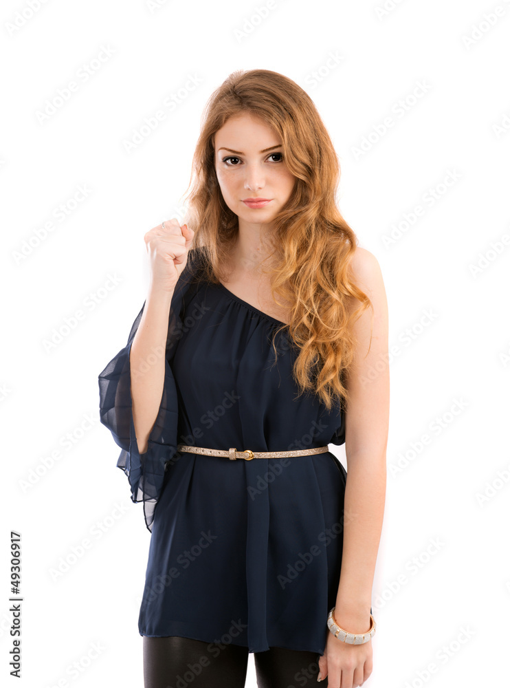 beautiful young woman showing his fist threateningly beautiful young woman showing his fist threateningly