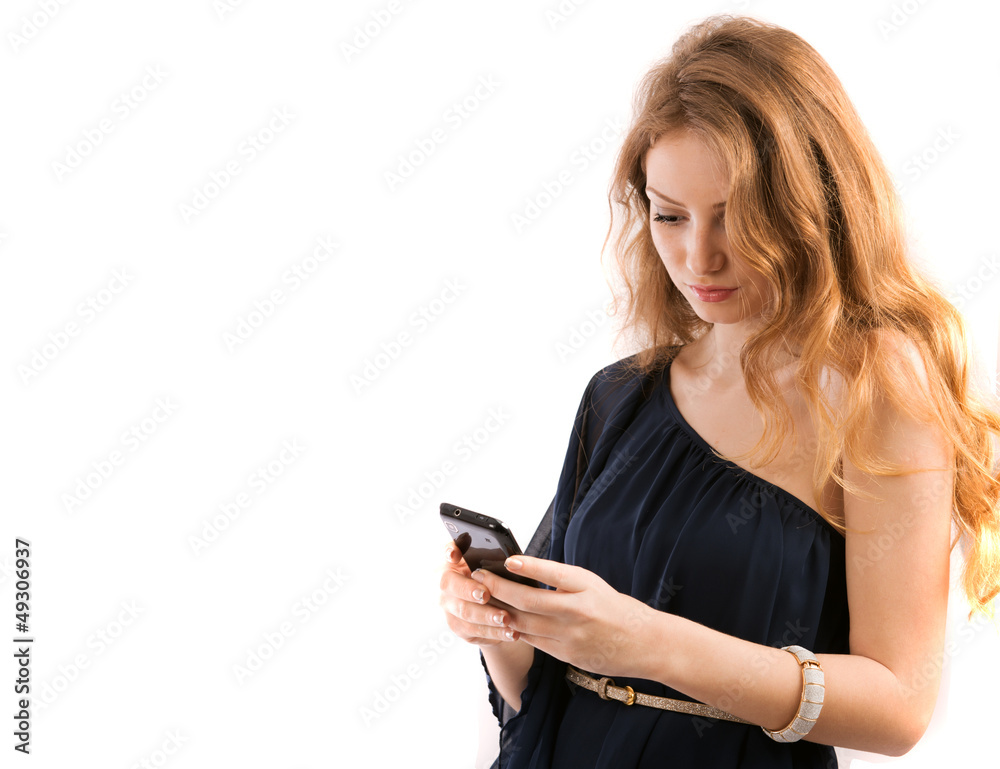 beautiful young woman looks in phone isolated on white backgroun beautiful young woman looks in phone isolated on white backgroun