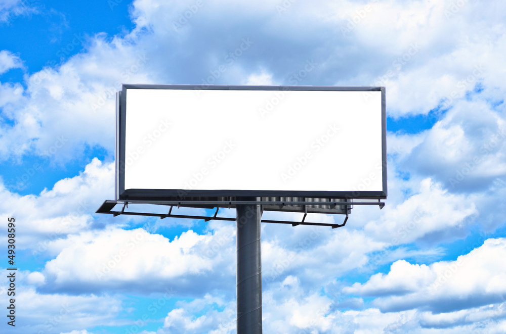 Huge blank billboard against bright blue sky Huge blank billboard against bright blue sky