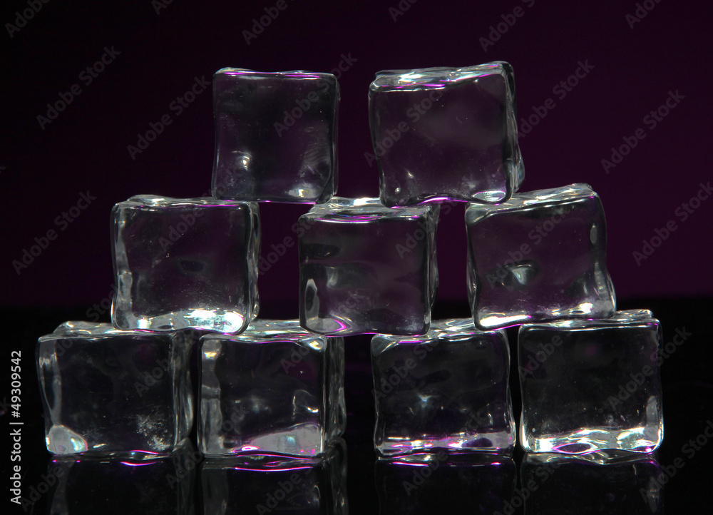 Ice cubes on dark purple background Ice cubes on dark purple background